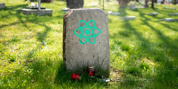 A gravestone with the Create React App logo printed on it